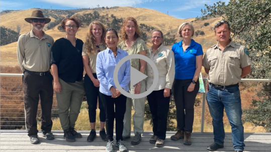 Secretary Haaland and Bureau of Land Management Director Tracy Stone-Manning pose with others at Berryessa Snow Mountain National Monument.
