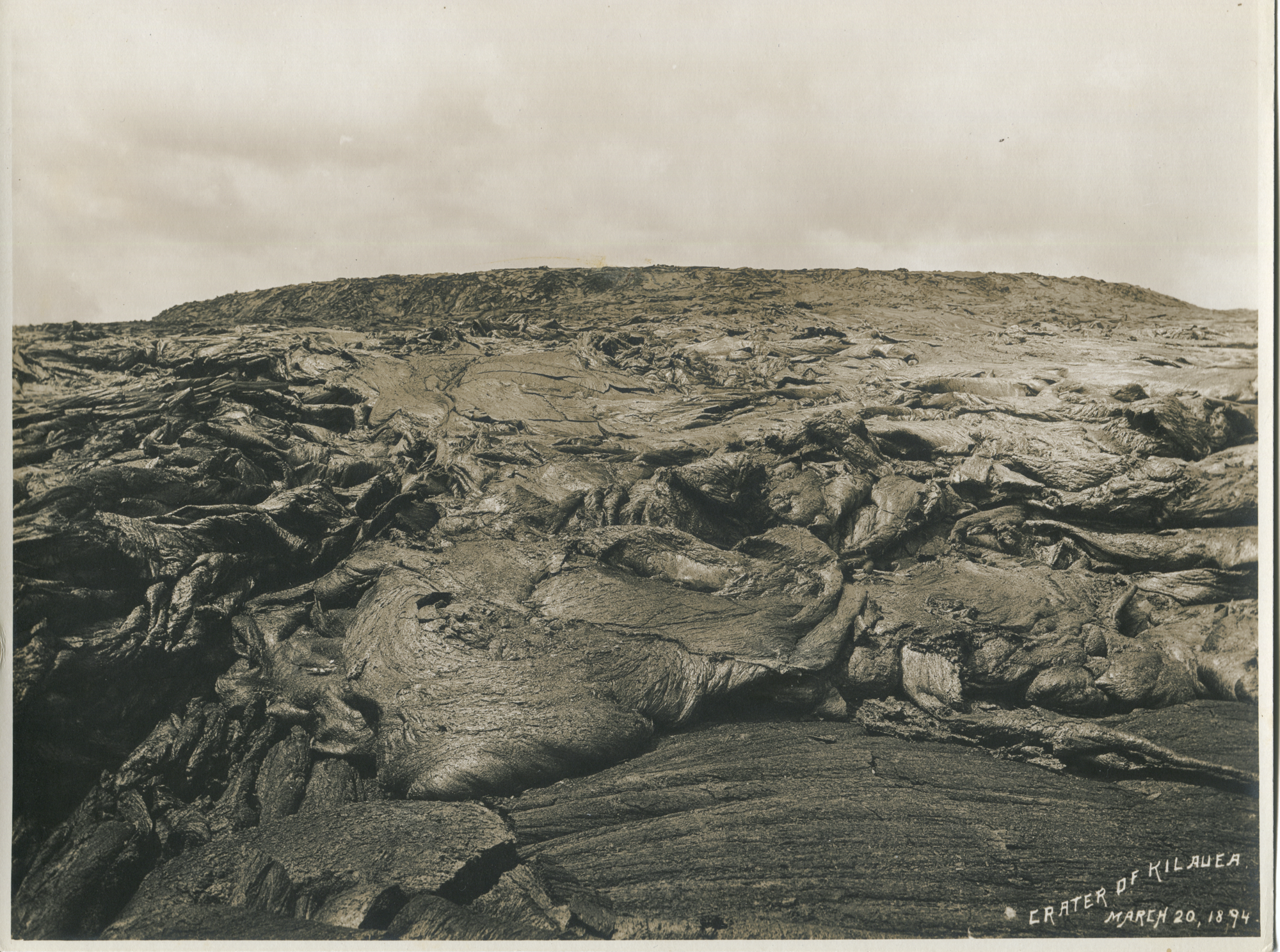 black-and-white photograph of volcanic terrain