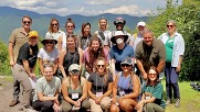 Photo of group of students with mountains in background