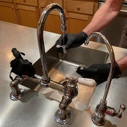 USGS scientist samples tap water for PFAS