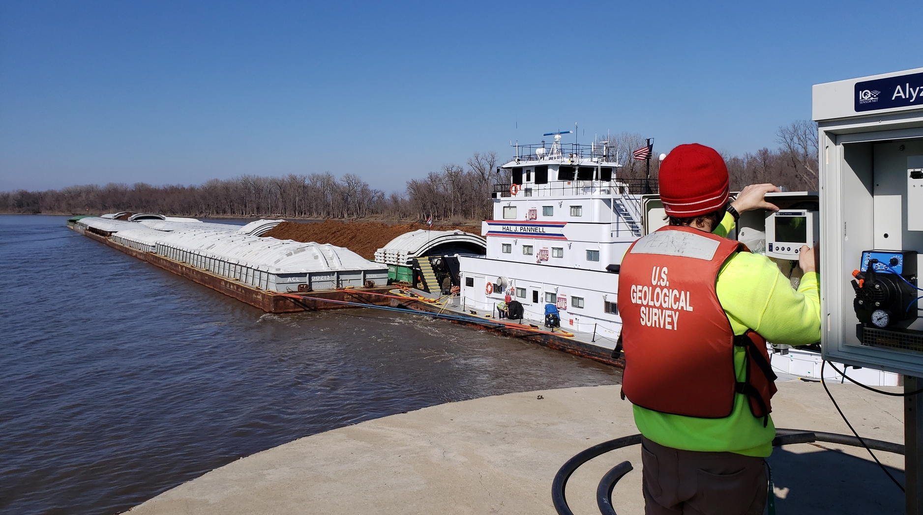 USGS hydrologist visits a water quality site on the Illinois River