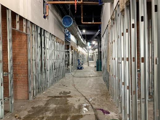 Construction of corridor with walls beams shown