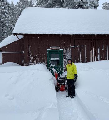 Elyssa shoveling