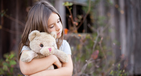 Girl with teddy bear