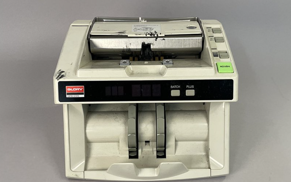 Money counter museum item