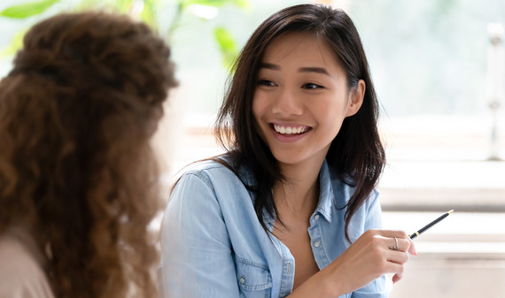 Two women talk