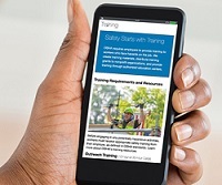OSHA's redesigned training webpage on a mobile phone.