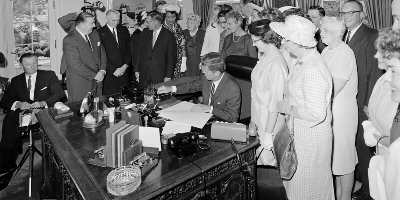 President JFK signs Equal Pay Act on June 10, 1963
