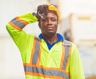 Construction worker experiencing outdoor heat