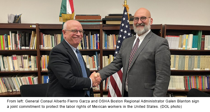 From left: General Consul Alberto Fierro Garza and OSHA Boston Regional Administrator Galen Blanton sign a joint commitment to protect the labor rights of Mexican workers in the United States. (DOL photo)