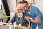 home health care worker with elderly man