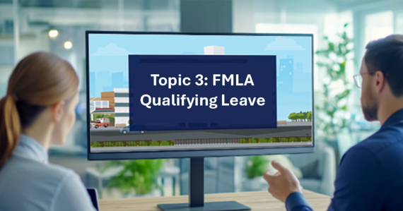 Two people looking at a computer monitor