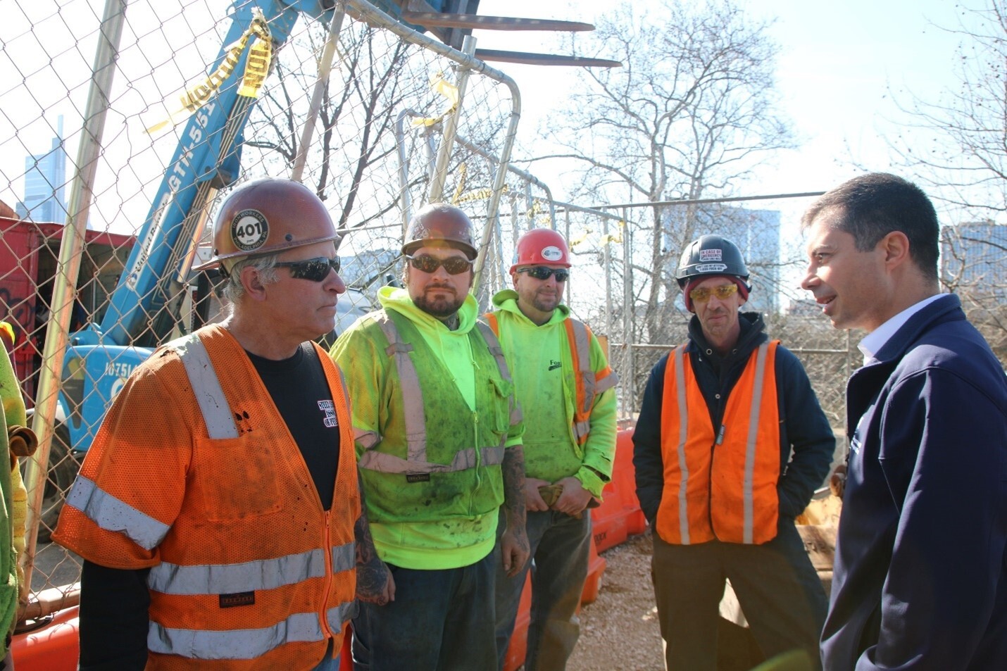 Secretary Buttigieg with workers at the MLK, Jr. Bridge 