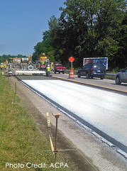 Concrete roadway with overlay.