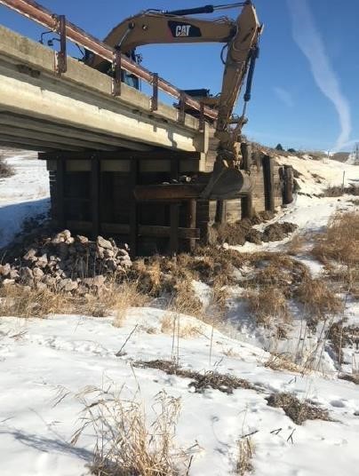 Excavator extension construction on a bridge in Crawford County, IA