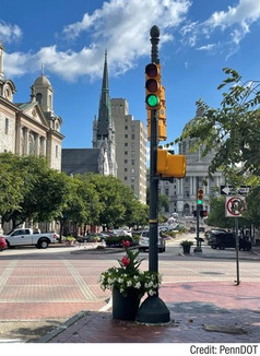 Traffic signal at intersection.
