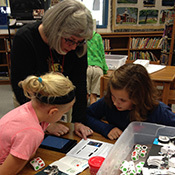 Students working on a STEM project with their teacher