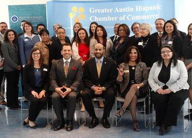 Deputy Director Marco Davis in the center alongside members of the Hispanic Chamber of Commerce