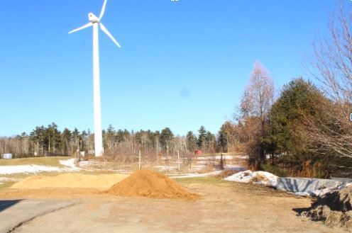 Camden Hills Regional High School wind turbine and compost pile