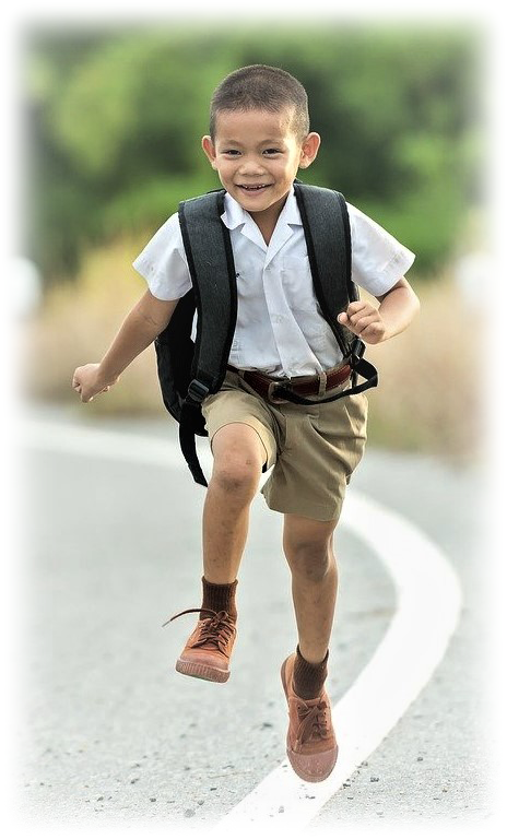 School boy running