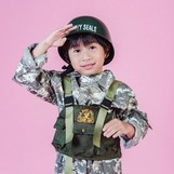 Child in military outfit saluting
