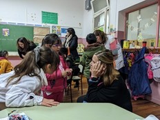 Argentina seminar participants interacting with students in an Argentine classroom
