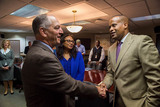 EDA Assistant Secretary Williams greets Louisiana Governor John Bel Edwards before a discussion on disaster recovery efforts after severe flooding.