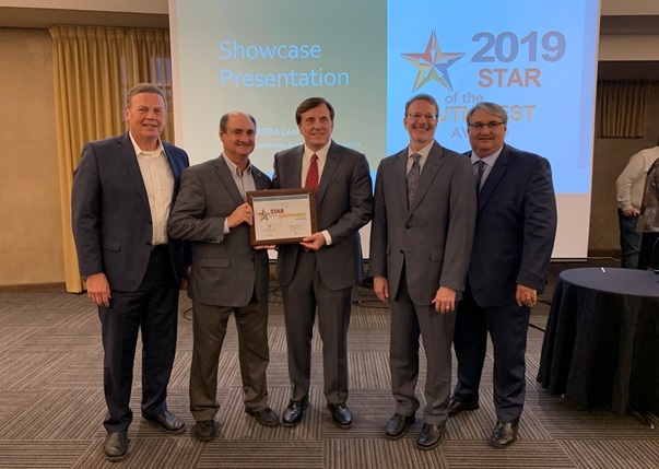 EDA Assistant Secretary John Fleming, Deputy Assistant Secretary Dennis Alvord and Austin Regional Director Jorge Ayala Presenting SWREDA Awards