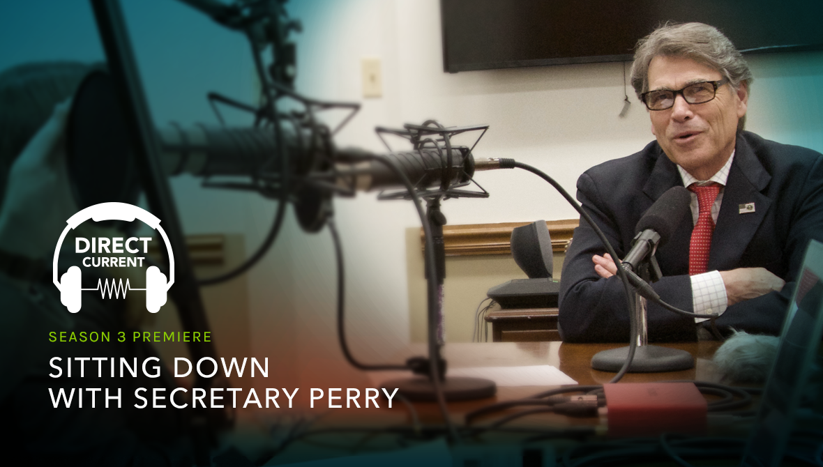 Secretary Perry sitting in a recording booth. 