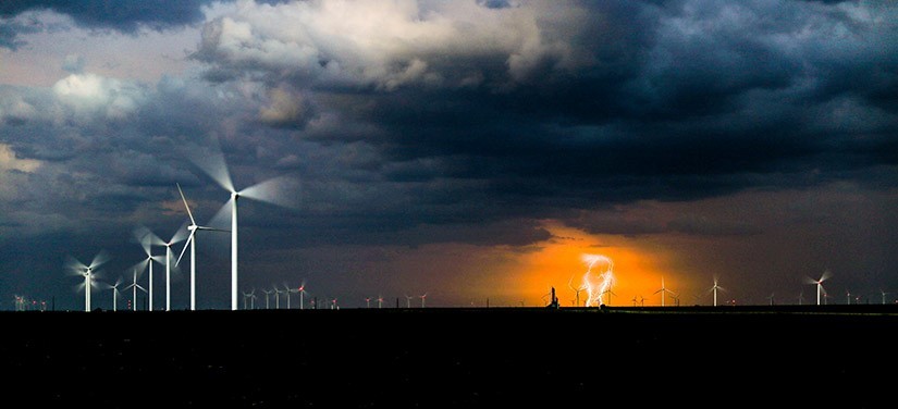Wind farm during a lightening storm.