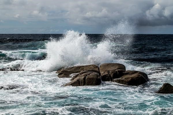 Ocean crashing against rocks.