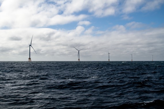 Offshore wind turbines in the ocean.