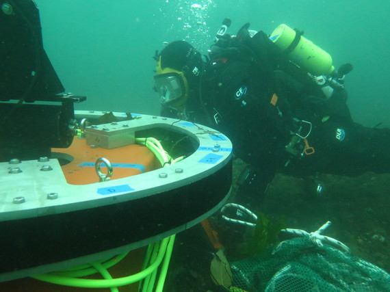 Researchers from Pacific Northwest National Laboratory perform biosonics testing using advanced underwater technology.