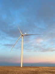 Wind turbine at sunset.