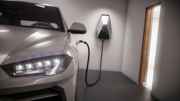 An electric vehicle charging in a residential garage