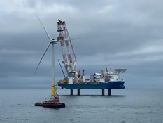 Offshore wind rig at sea.