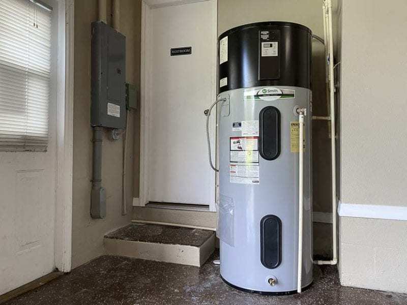A water heater in a garage