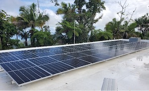 Solar, roof-mounted PV array on the Iguaca Aviary.