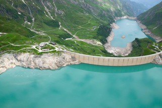 Aerial view of a dam, reservoir, and river