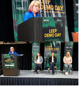 a person speaking on a panel at LEEP demo day
