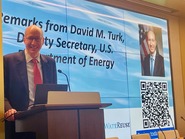 A man standing behind a podium