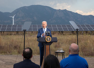 President Biden speaks at a podium. 