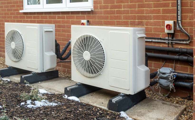 Air-source heat pumps outside of a home.