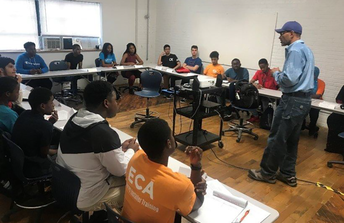 Students at the Frankford High School Solar Lab participate in a classroom session of the Bright Solar Futures program.
