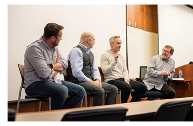 Corey Tyree speaks as part of a panel at a university event.