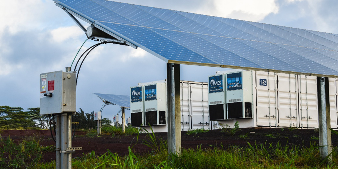 Rows of solar panels in field