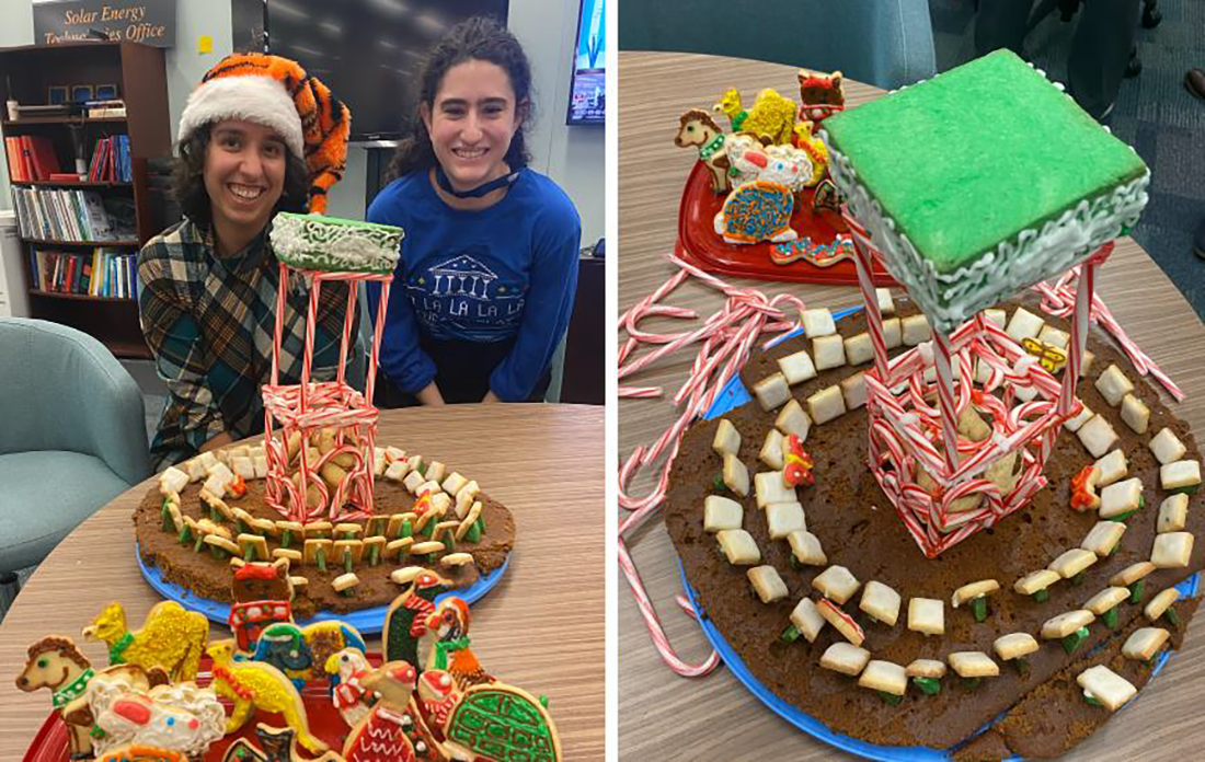 SETO baking experts Krysta Dummit and Rebecca Glaser with their edible replica of a CSP systems plant, made of candy canes, cookies, and frosting.
