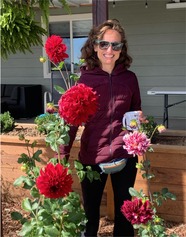H2O Director Nichole Fitzgerald poses in her garden