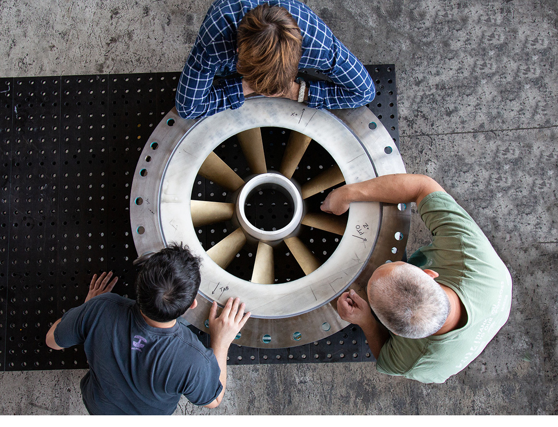 A team prototypes a scale-model turbine used for fish passage testing. Photo from Andrew Baumgartner, Natel Energy
