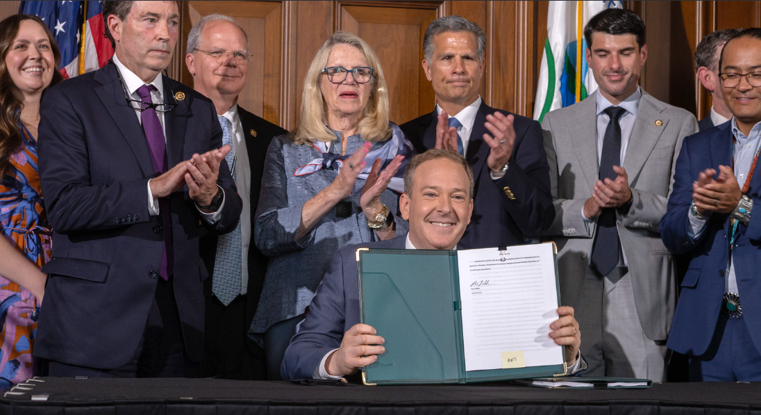 Zeldin and EPA staff pose with signed proposal to repeal Biden-Harris EPA regulations for power plants.